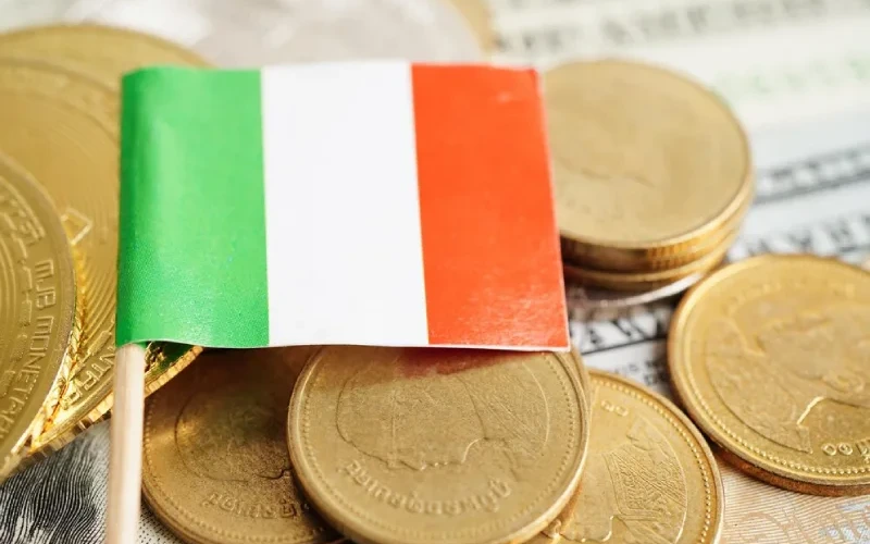 Italian flag on gold coins representing financial proof for Italy visa