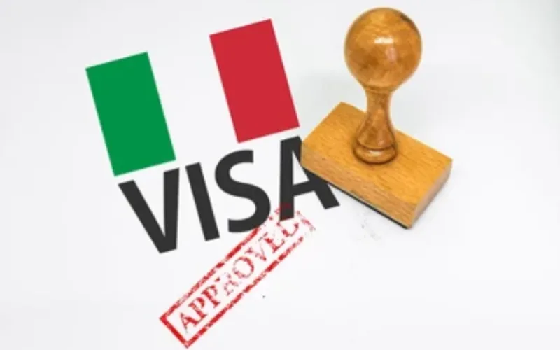 Italy visa approved stamp with Italian flag and wooden rubber stamp
