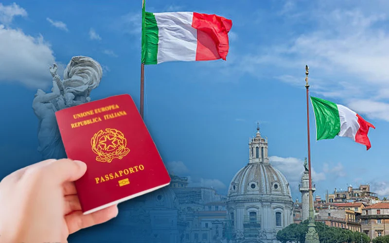 Hand holding an Italian passport with the Italian flag and Rome cityscape in the background